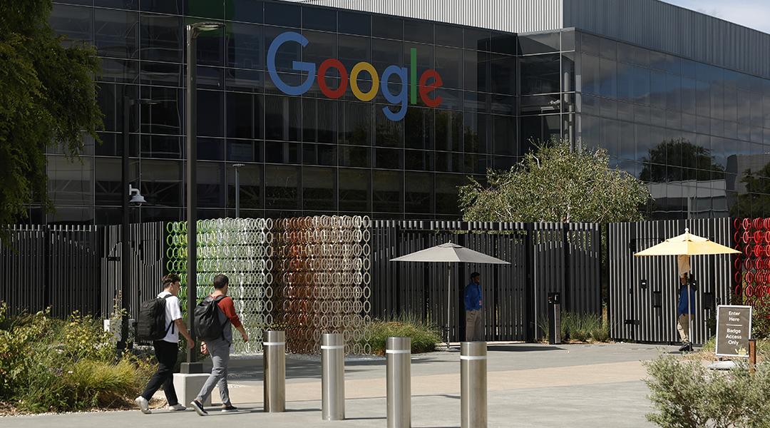 orkers enter a building on the Google headquarters campus in Mountain View, California.