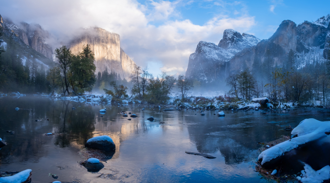 A lake and mountains in the background in Yosemite National Park in California in winter.